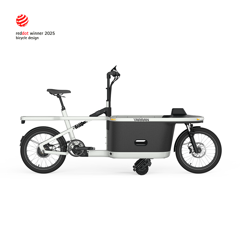 TARRAN T1 Pro cargo e-bike, Red Dot winner 2025, in Stardust Silver & Black with integrated cargo box and landing gear.